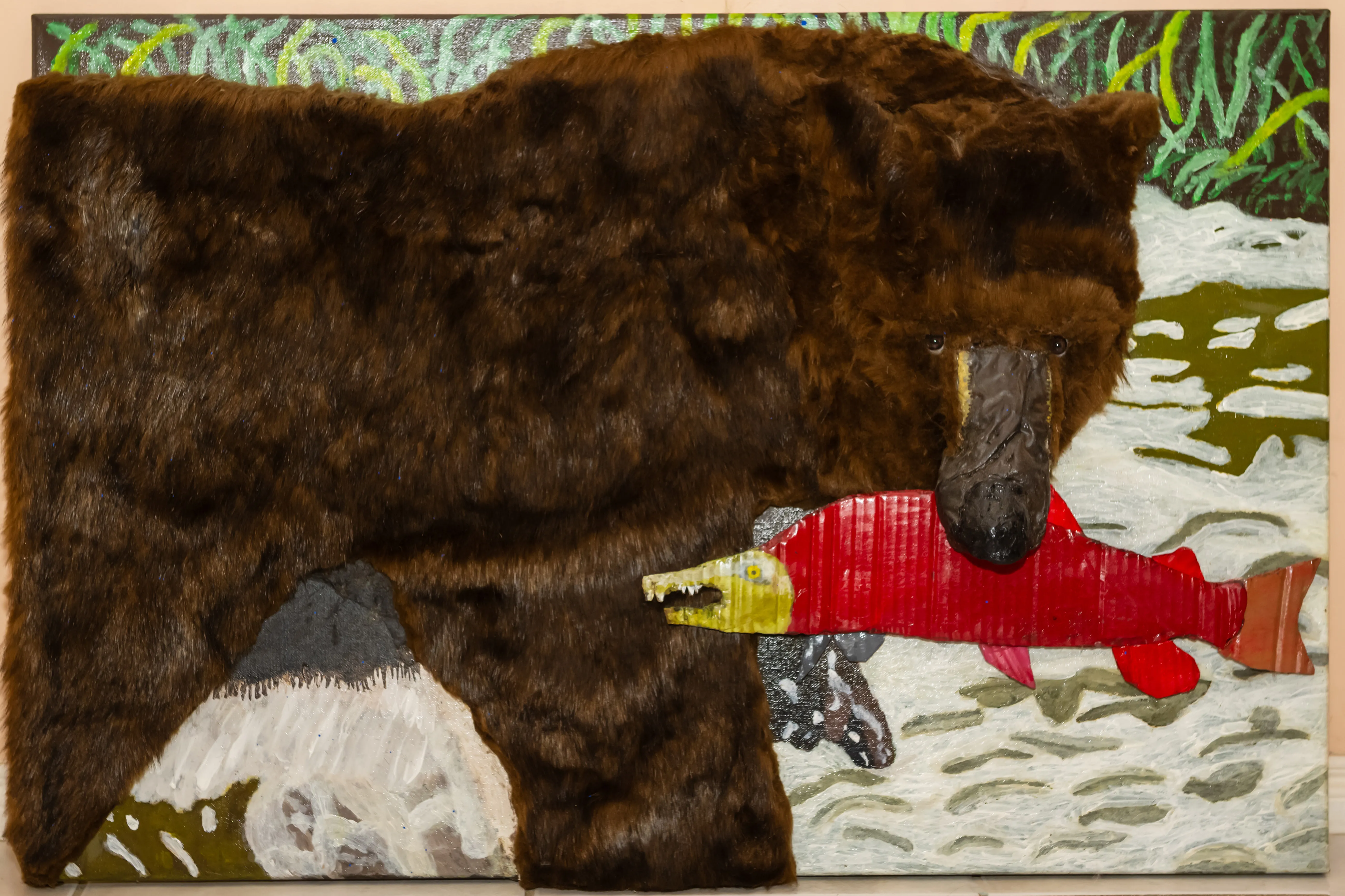 Grizzly bear catching salmon artwork